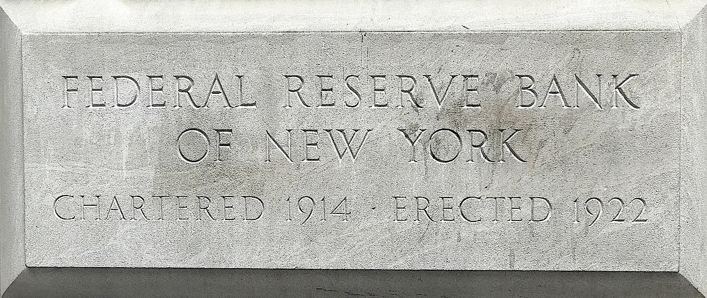 wall stone plaque reading 'Federal Reserve Bank of New York'