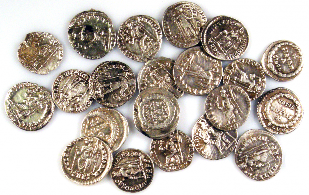Image of Roman silver denarii, scattered about