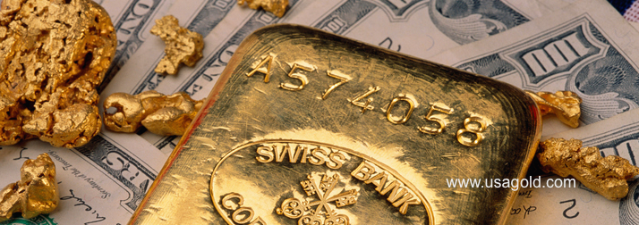 photo of gold bullion bar on a $100 bill