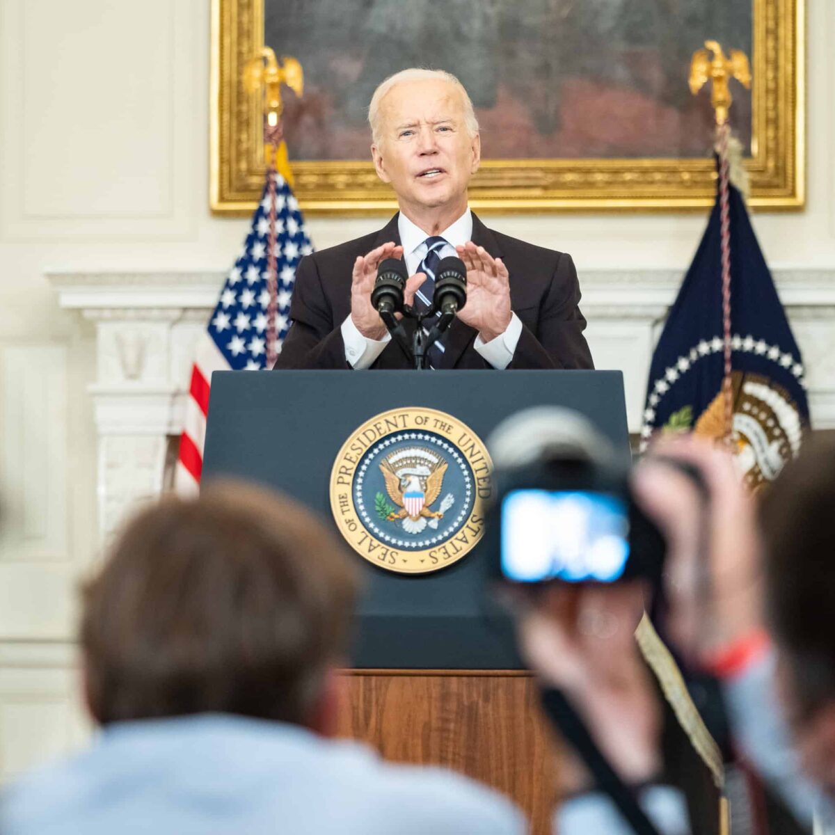 photo of President Biden at the podium prress conference