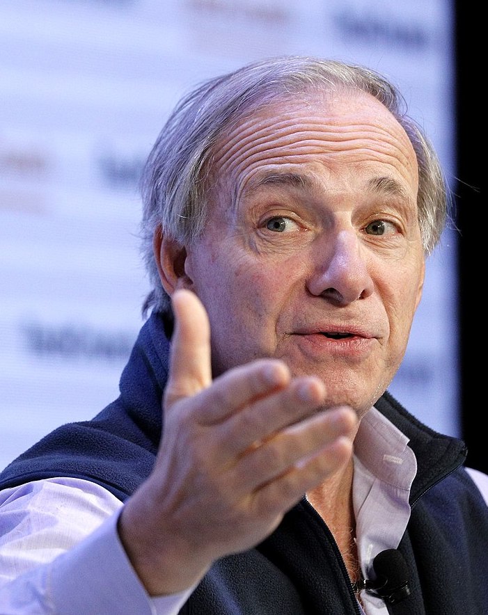 photograph of Ray Dalio making a point at an investment conferrence