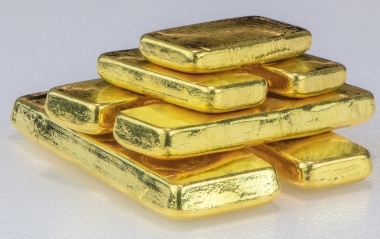 photograph of stacked gold bullion bars