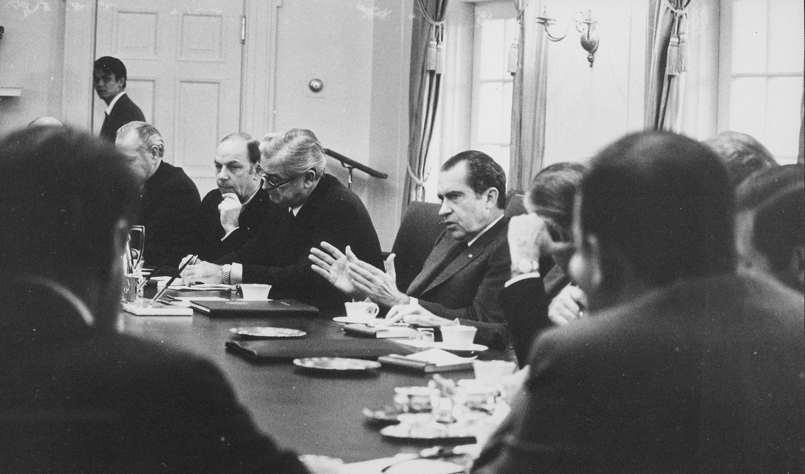 photograph of Richard Nixon conduction meeting of his cabinet in 2971
