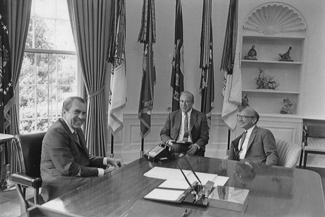 photo of Nixon, Schultz and Friedman meeting in the White House Oval Office two months before announcement to abandon the gold standard