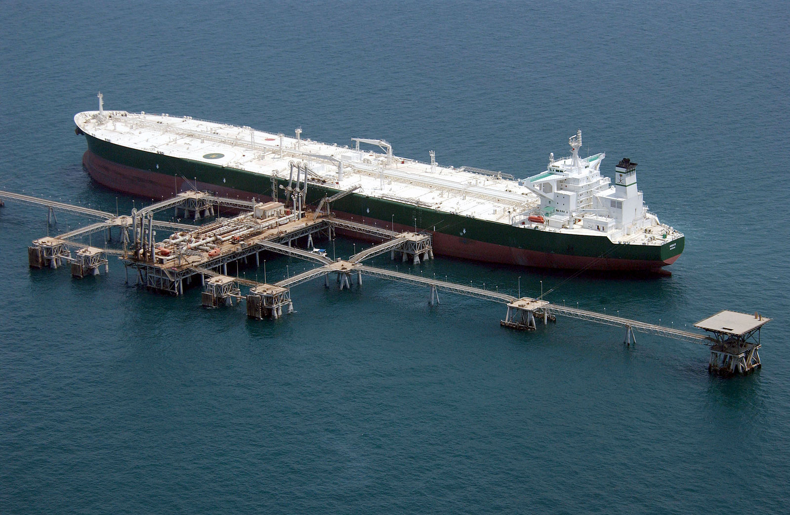 photograph of an oil tanker being loaded at Iraqi oil installation