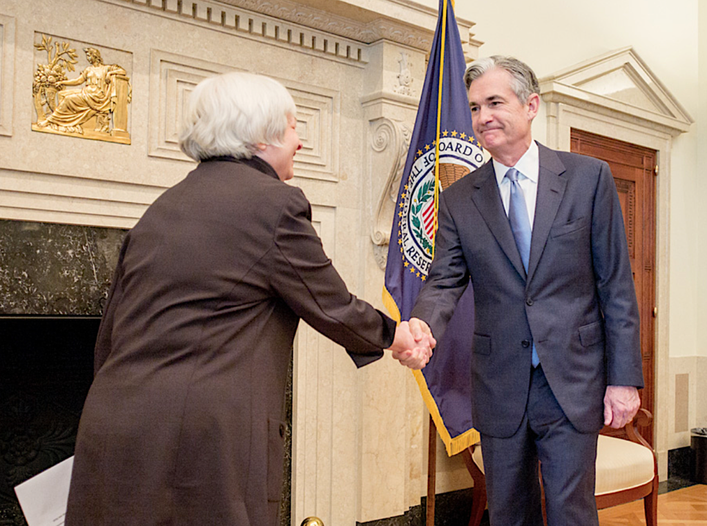 photo of Powell and Yellen shaking hands